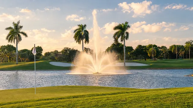 The golf resort at Doral, its fountain at golden hour.