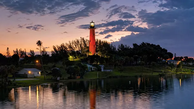 Jupiter Inlet Lighthouse at dusk, lit since 1860.