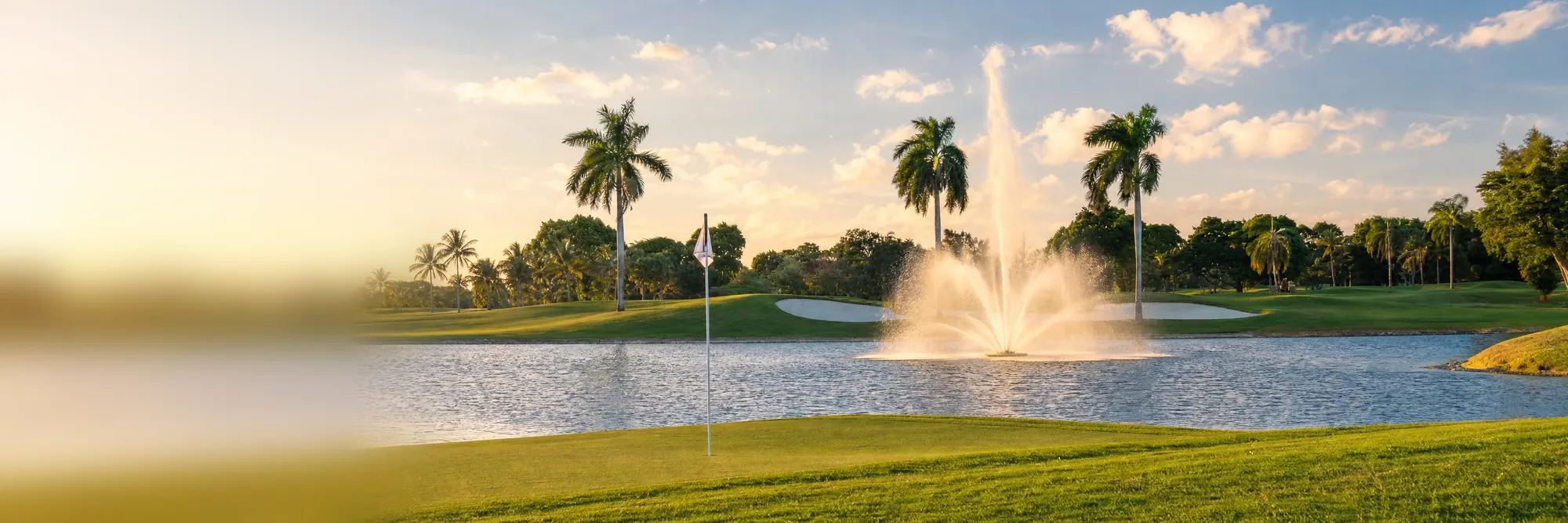 The golf resort at Doral, its fountain at golden hour.