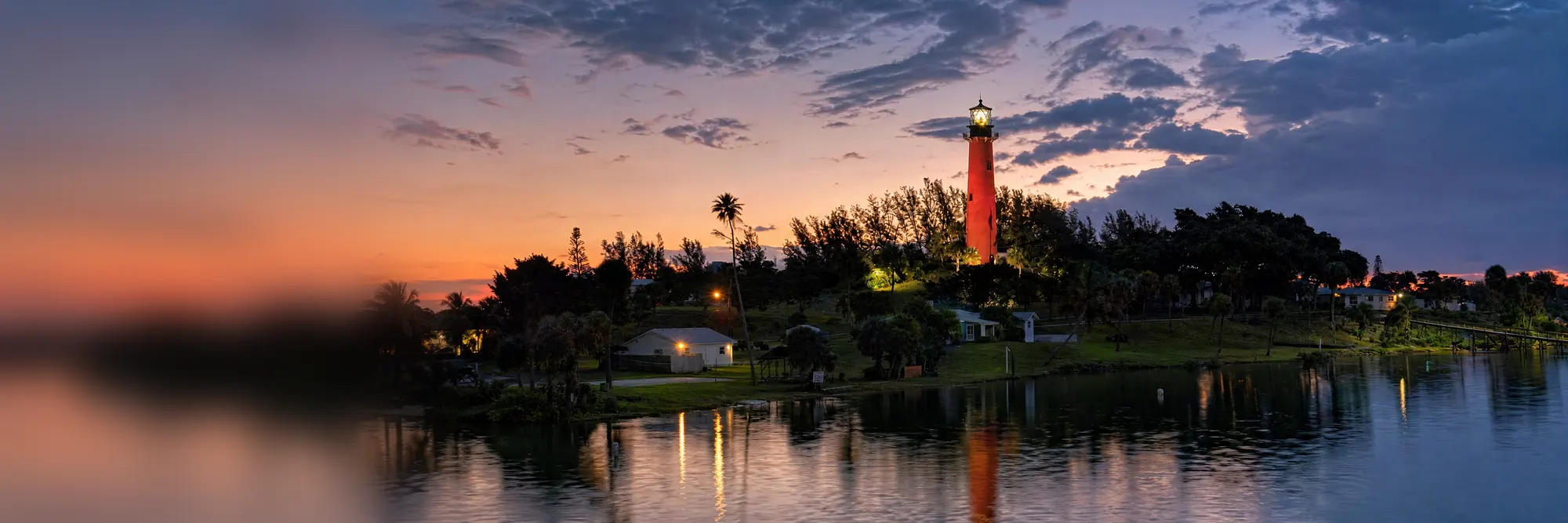 Jupiter Inlet Lighthouse at dusk, lit since 1860.