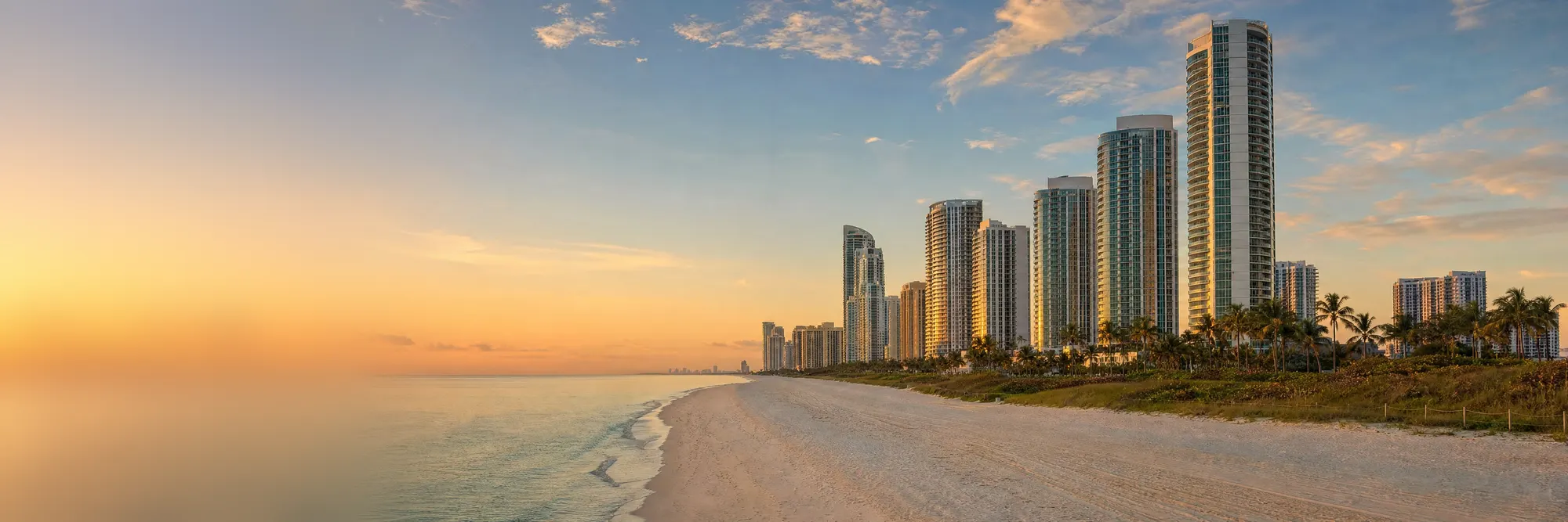 Oceanfront towers catching the sunrise.