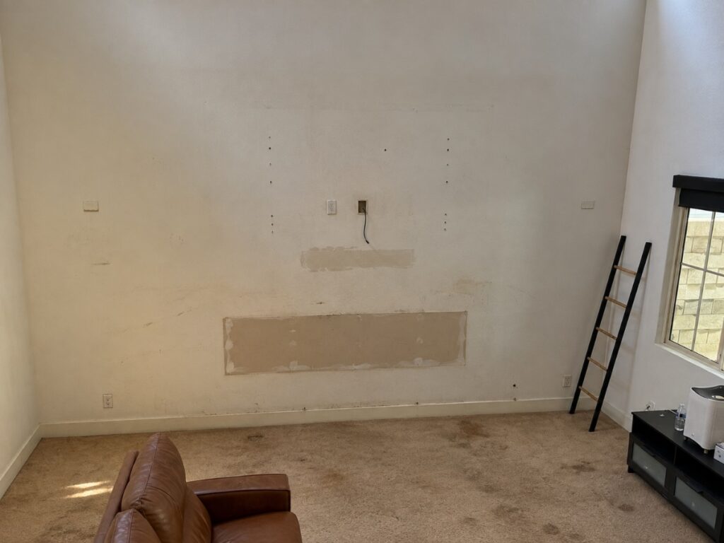Stacked Stone Fireplace Wall — before